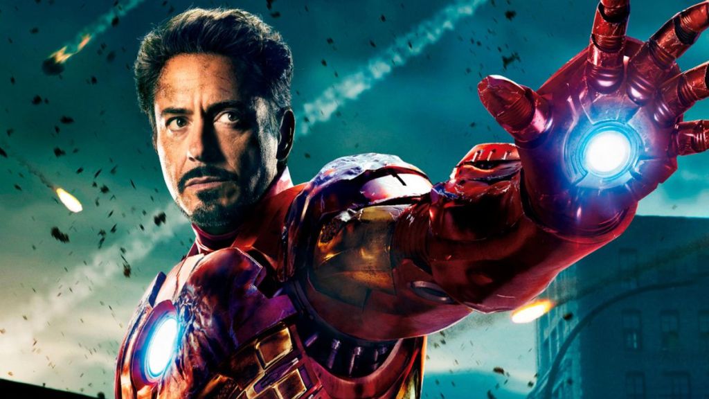 Robert Downey Jr. as Iron-Man holding his hand out to use a repulsor