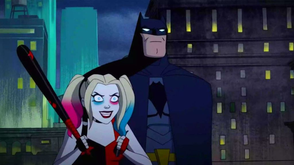 Harley Quinn and Batman standing on a rooftop