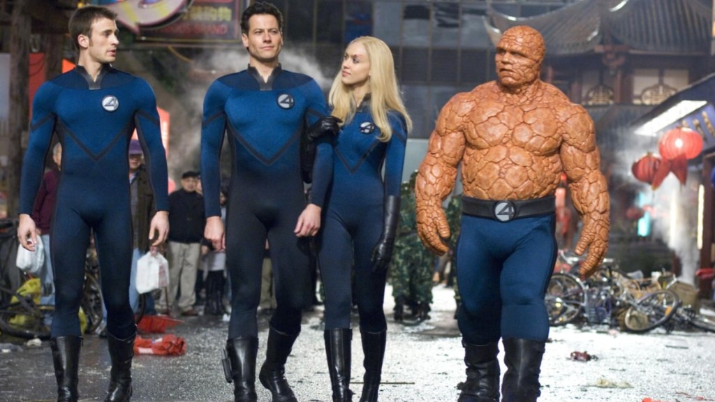 The Fantastic Four stand on the street.