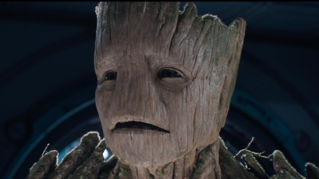 Groot looks and stares.
