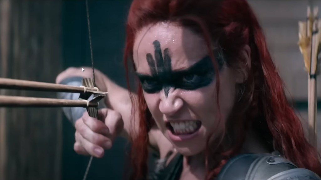 Matilda Lutz as Red Sonja in raven war paint