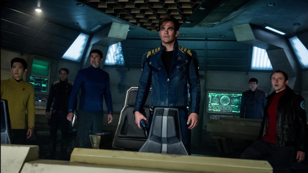 The crew of the Enterprise stand and stare.