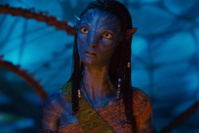 Zoe Saldana stares and looks.