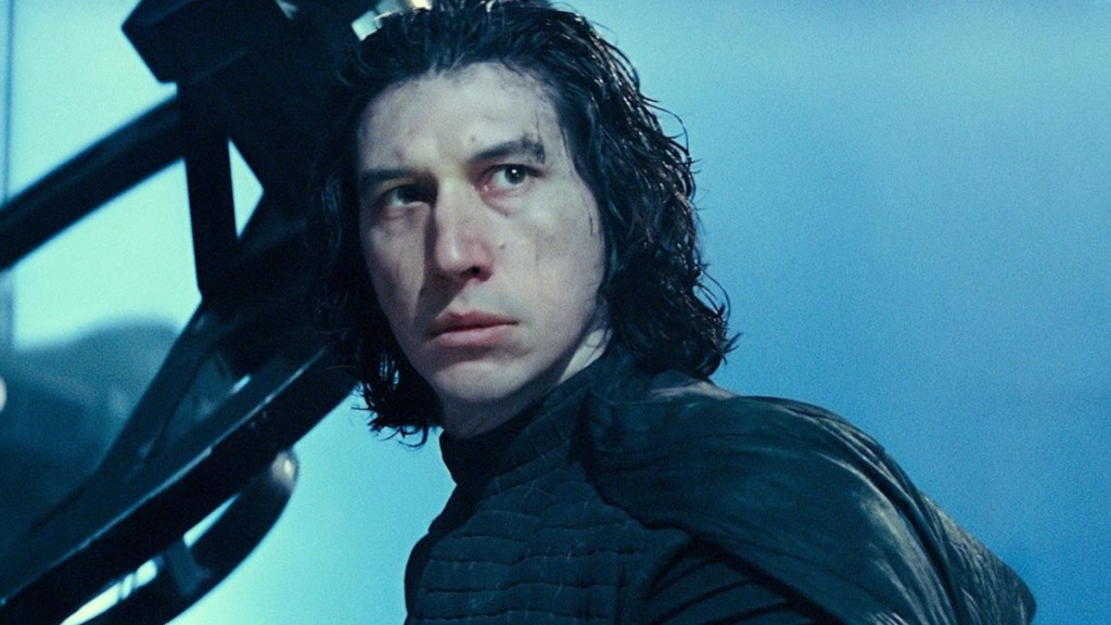 Adam Driver looks and stares menacingly.