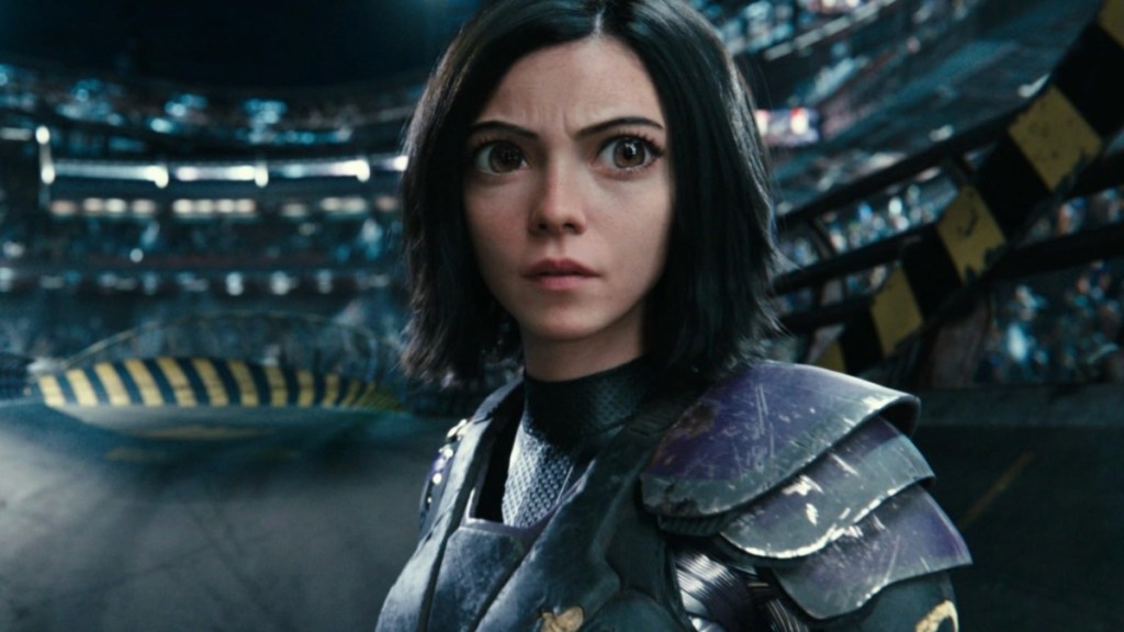 A woman looks back in Alita: Battle Angel.
