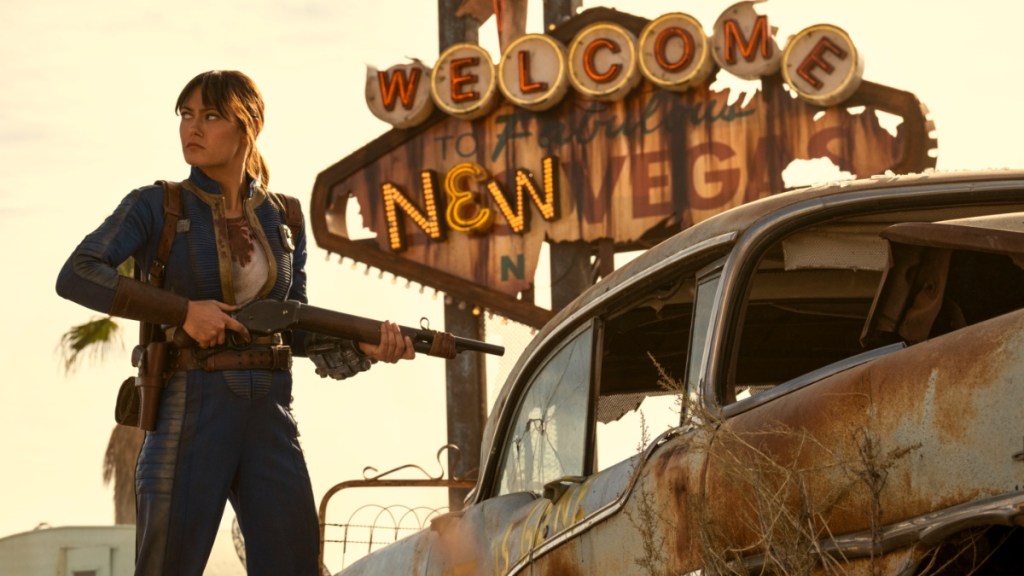 A girl holds a gun in Fallout Season 2.