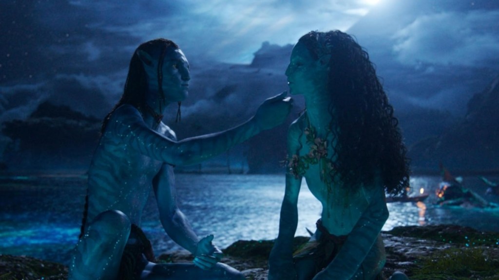 Two Na'vi sit on a whale in Avatar 3.