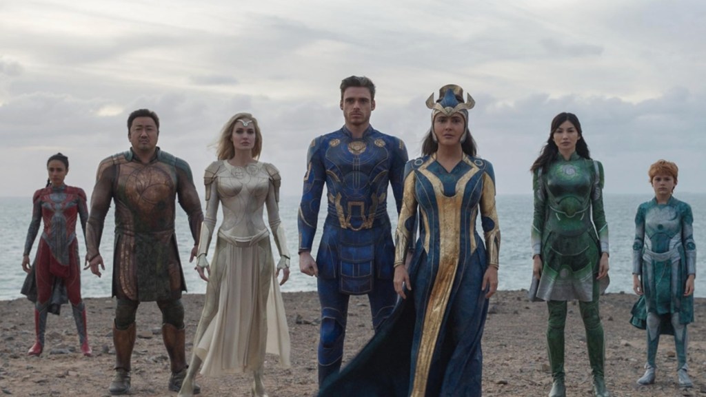 The Eternals stand together in a line.