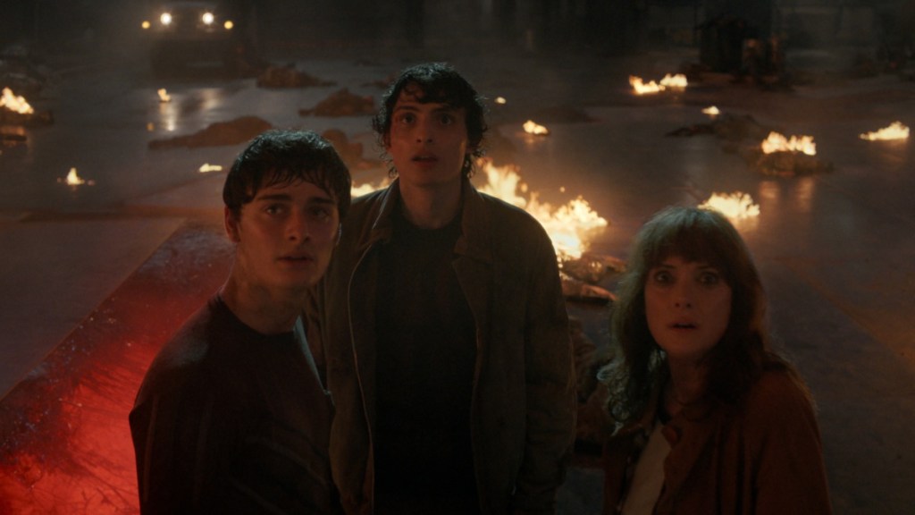 Mike, Will, and Joyce look up in Stranger Things Season 5 Volume 2 trailer.