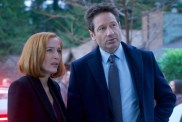 Mulder and Scully stand in The X-Files.