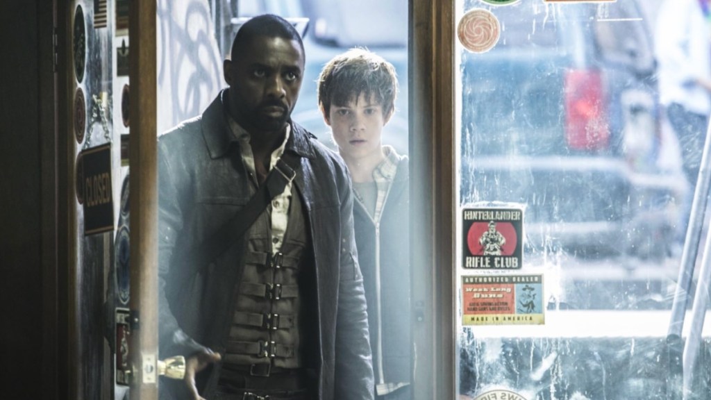 Idris Elba stands in a door in The Dark Tower.