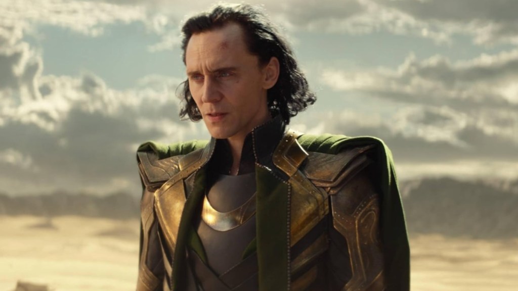 Tom Hiddleston looks as Loki.