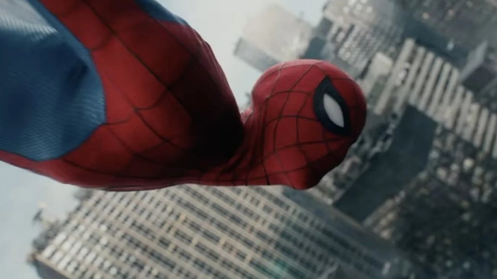 Tom Holland flying down as Spider-Man.