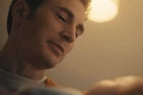 Chris Evans holding a baby in Avengers: Doomsday.