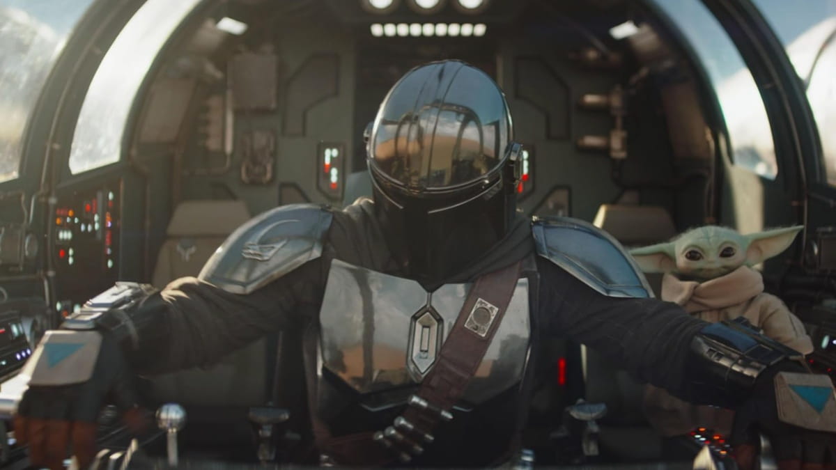 Mando and Grogu in a ship in The Mandalorian and Grogu.