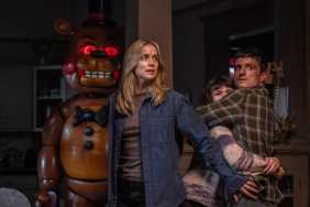 A group of people hold each other back in Five Nights at Freddy's 2.