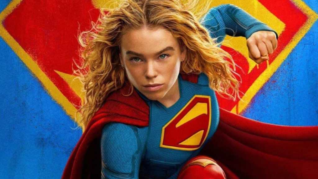 Milly Alcock holds up a fist as Supergirl.