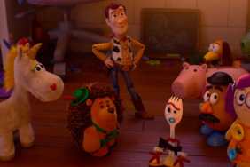 Woody stands around his friends in Toy Story 5.