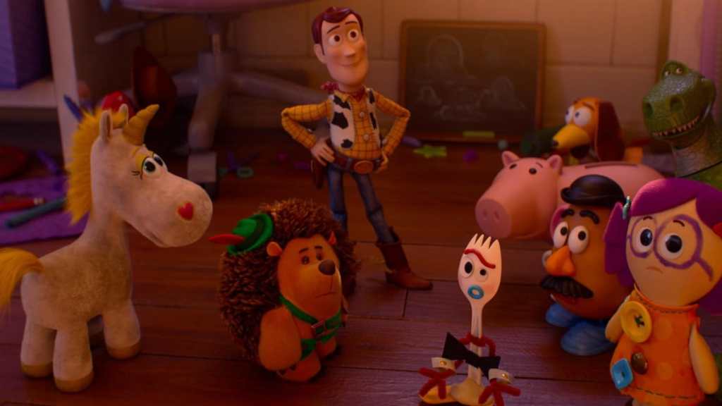 Woody stands around his friends in Toy Story 5.