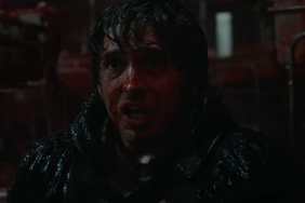 A bloody Austin Abrams screams in Resident Evil.