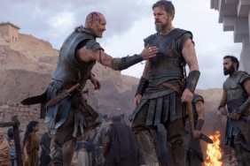 Matt Damon walks by a soldier in The Odyssey.