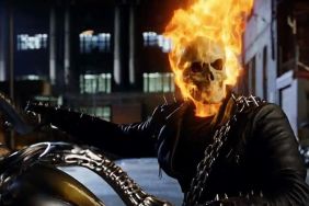 Ghost Rider sitting on a bike with his skull on fire