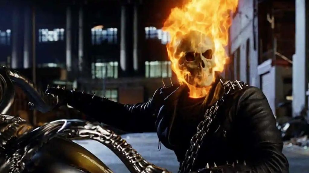 Ghost Rider sitting on a bike with his skull on fire