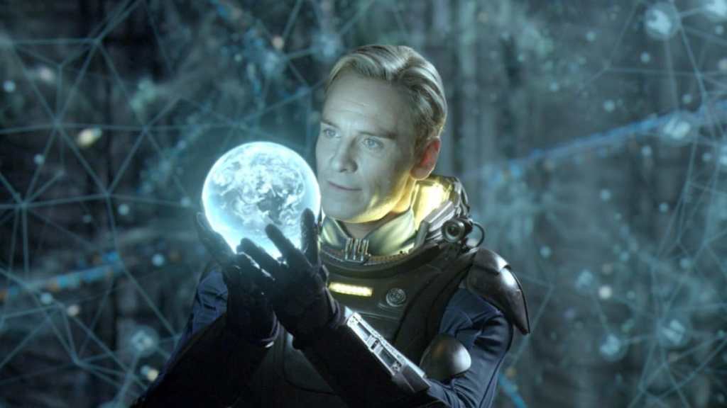 Michael Fassbender holds something in Prometheus.