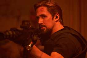 Ryan Gosling points gun and shoots in The Gray Man.