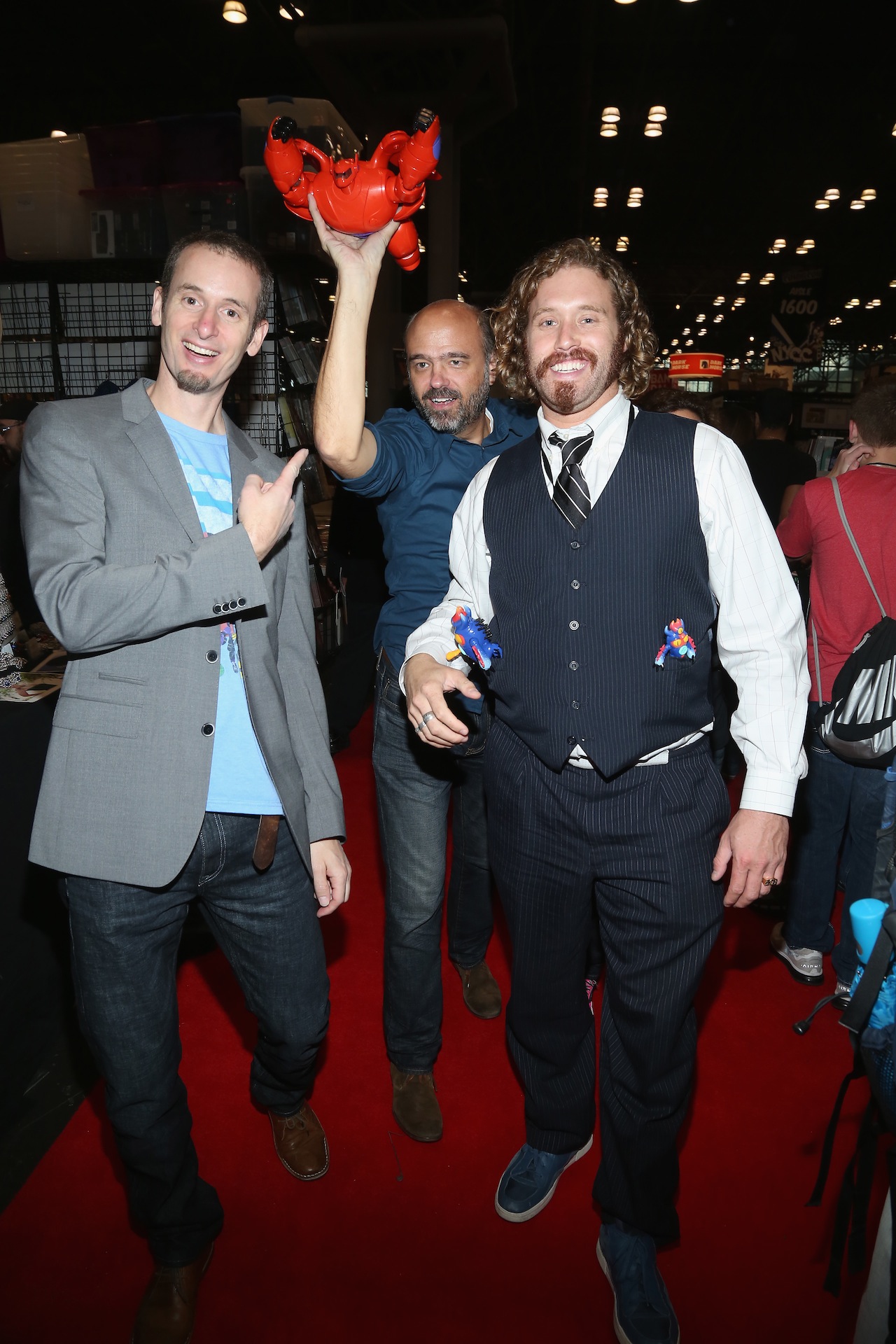 NEW YORK, NY - OCTOBER 09:  (L-R) Director Chris Williams, Scott Adsit, and T.J. Miller attend Walt Disney Studios' 2014 New York Comic Con presentations of "Big Hero 6" and "Tomorrowland" at the Javits Convention Center on Thursday October 9, 2014 in New York City.  (Photo by Jason Carter Rinaldi/Getty Images for Disney) *** Local Caption *** Chris Williams;Scott Adsit;TJ Miller
