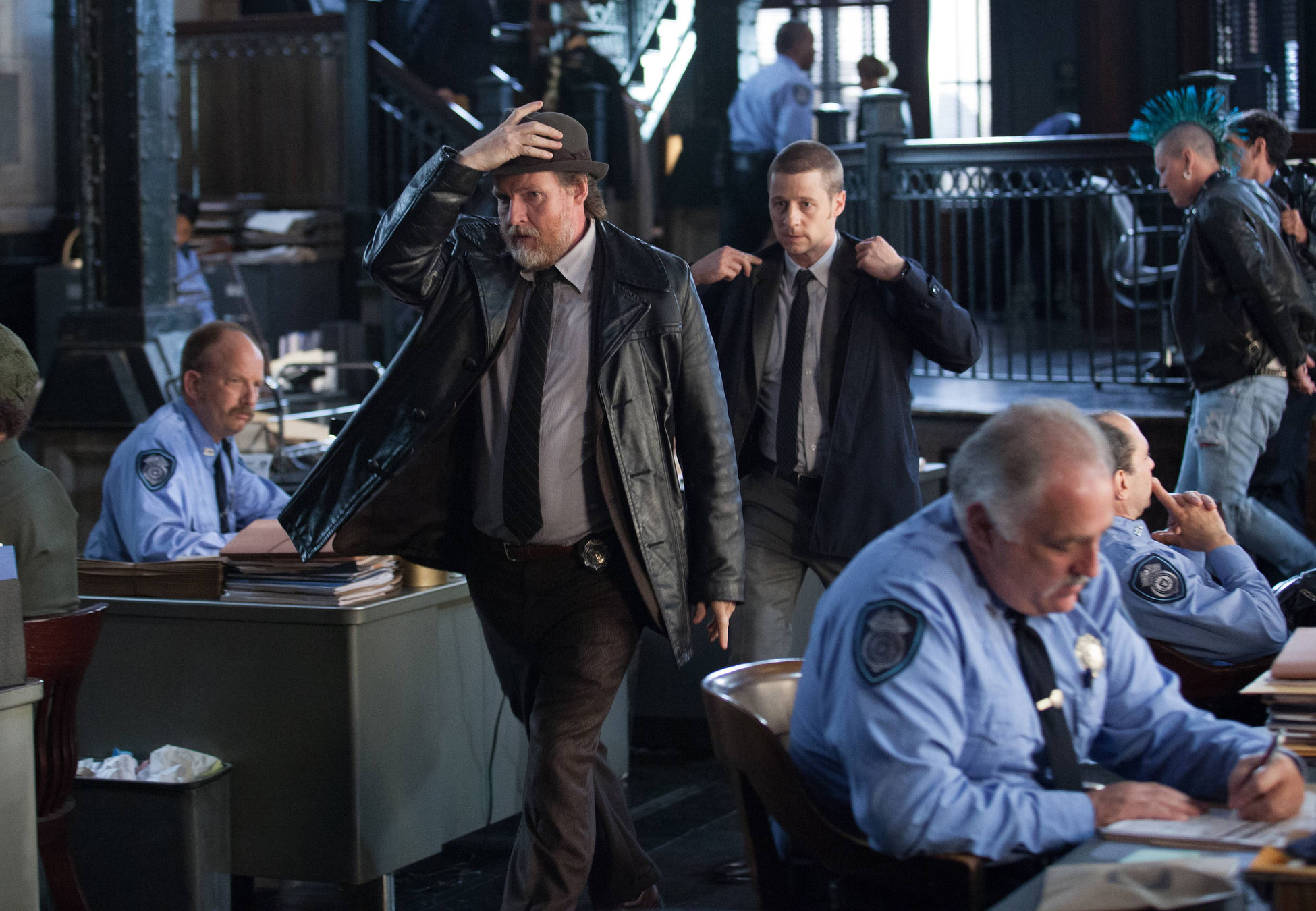 GOTHAM: Detectives Harvey Bullock (Donal Logue, L) and James Gordon (Ben McKenzie, R) leave the GCPD princint in the "The Balloonman" episode of GOTHAM airing Monday, Oct. 6 (8:00-9:00 PM ET/PT) on FOX. Â©2014 Fox Broadcasting Co. Cr: Jessica Miglio/FOX
