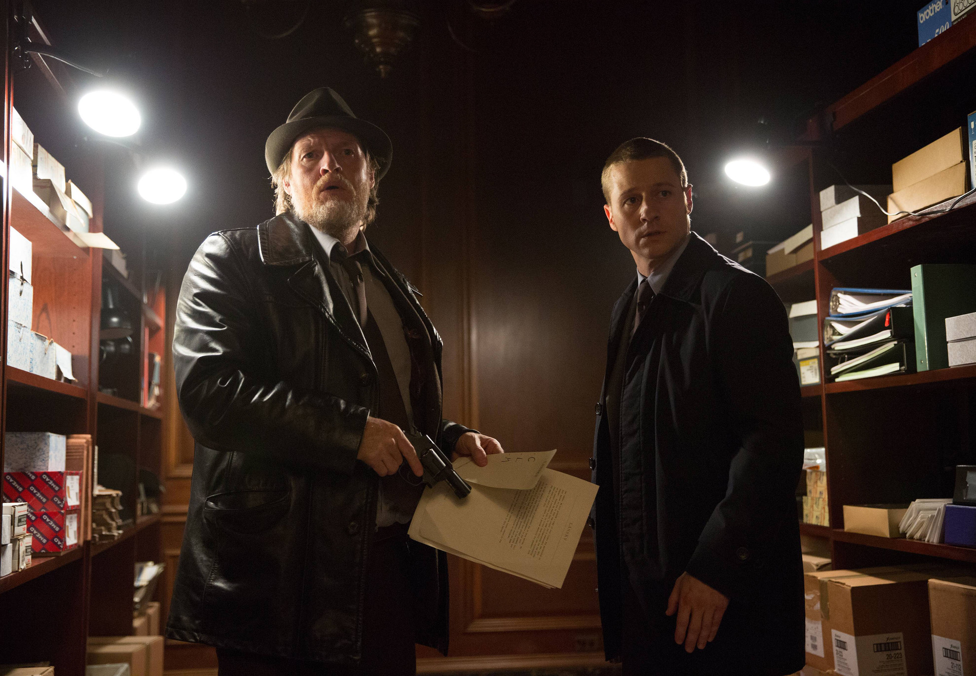 GOTHAM: Detectives Harvey Bullock (Donal Logue, L) and James Gordon (Ben McKenzie, R) find a piece of evidence in the "Arkham" episode of GOTHAM airing Monday, Oct. 13 (8:00-9:00 PM ET/PT) on FOX. Â©2014 Fox Broadcasting Co. Cr: Jessica Miglio/FOX