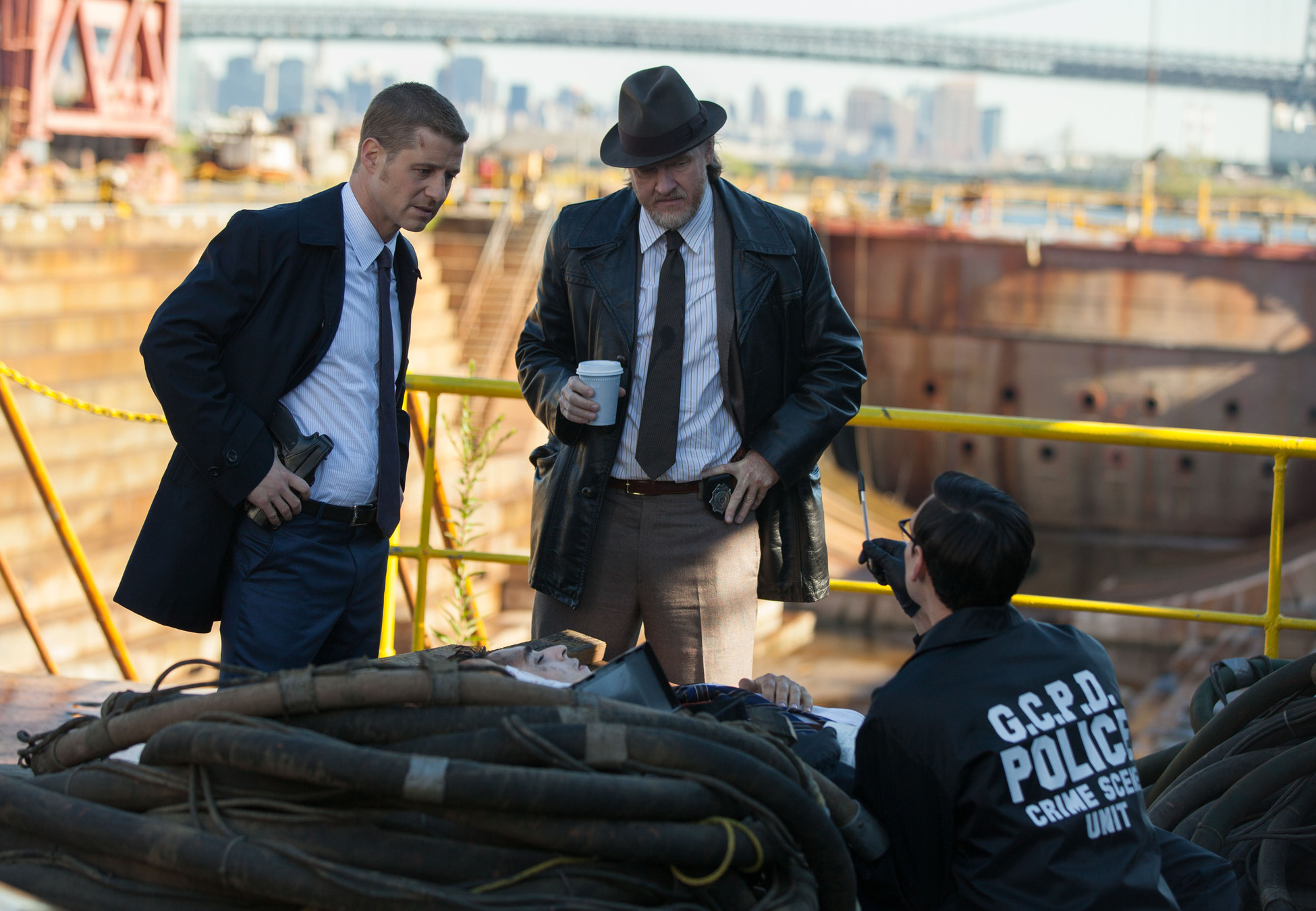 GOTHAM: Edward Nygma (Cory Michael Smith, R) and Detectives James Gordon (Ben McKenzie, L) and Harvey Bullock (Donal Logue, C) examine a crime scene in the "The Mask" episode of GOTHAM airing Monday, Nov. 10 (8:00-9:00 PM ET/PT) on FOX. Â©2014 Fox Broadcasting Co. Cr: Jessica Miglio/FOX