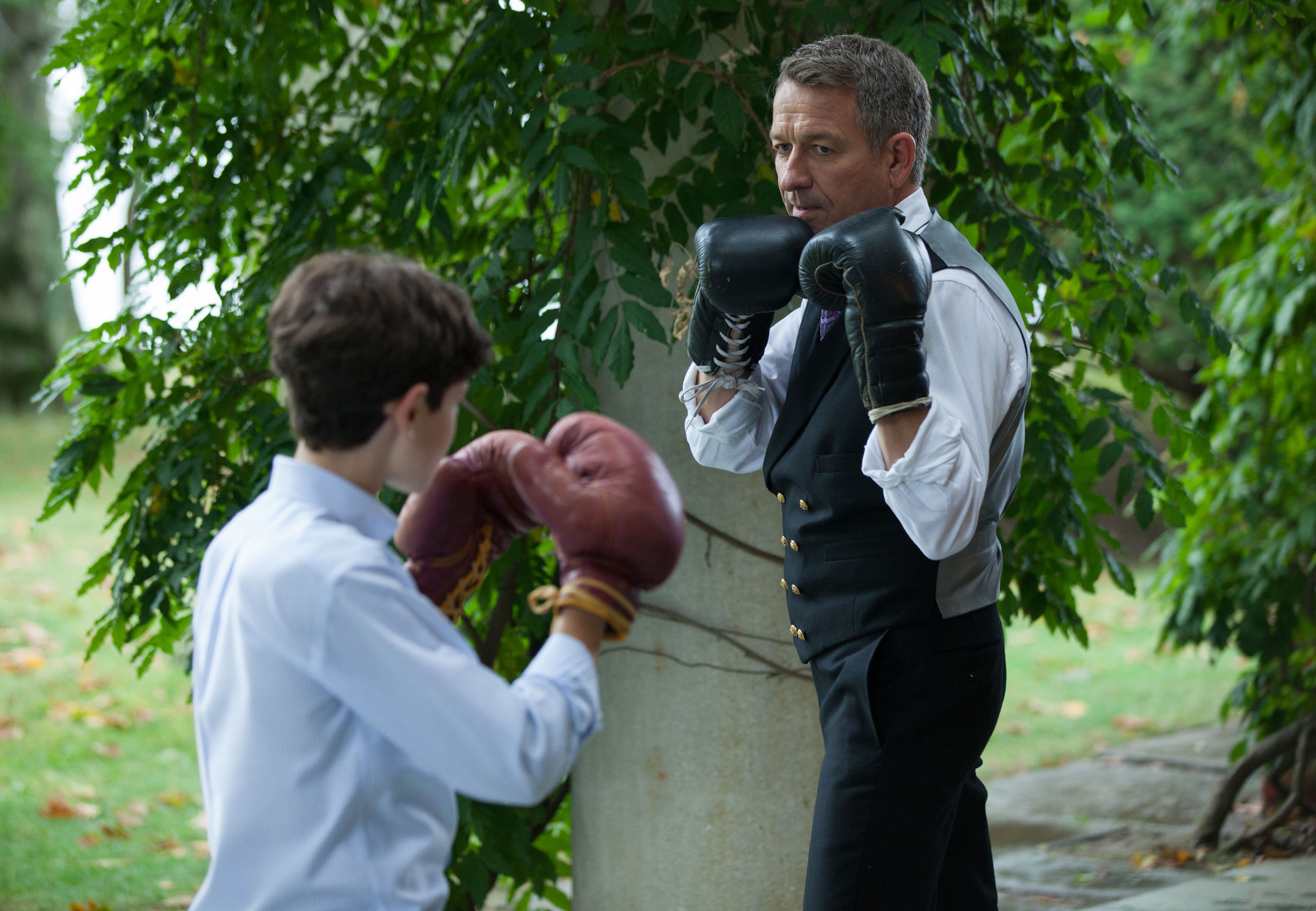 GOTHAM: Alfred (Sean Pertwee, R) gives Bruce (David Mazouz, L) a lesson on fighting in the "Harvey Dent" episode of GOTHAM airing Monday, Nov. 17 (8:00-9:00 PM ET/PT) on FOX. Â©2014 Fox Broadcasting Co. Cr: Jessica Miglio/FOX