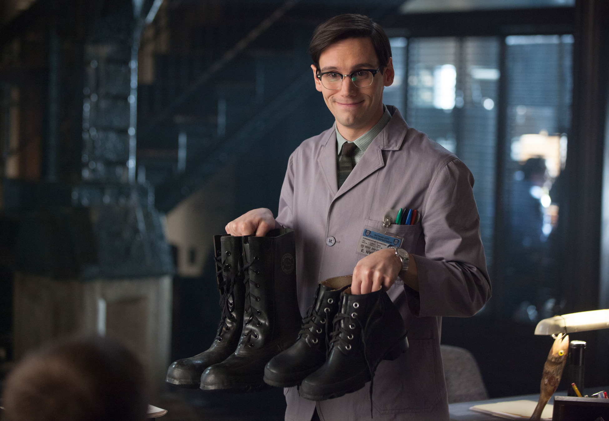 GOTHAM: Edward Nygma (Cory Michael Smith) suggests Detectives James Gordon and Harvey Bullock wear protective boots in the "What The Little Bird Told Him" episode of GOTHAM airing Monday, Jan. 19 (8:00-9:00 PM ET/PT) on FOX. Â©2014 Fox Broadcasting Co. Cr: Jessica Miglio/FOX