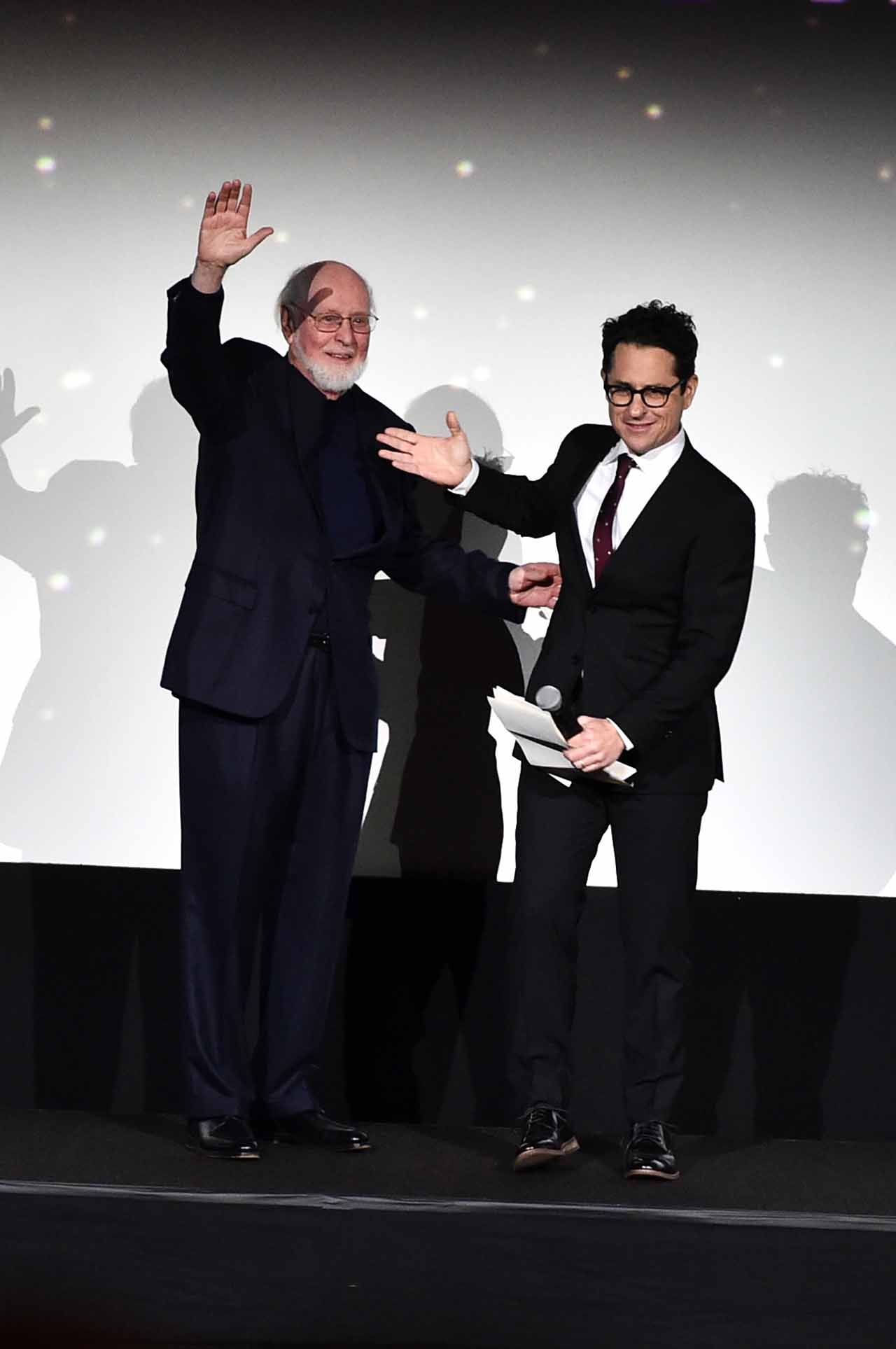 HOLLYWOOD, CA - DECEMBER 14: Composer John Williams (L) and director J.J. Abrams speak onstage during the World Premiere of ?Star Wars: The Force Awakens? at the Dolby, El Capitan, and TCL Theatres on December 14, 2015 in Hollywood, California.  (Photo by Alberto E. Rodriguez/Getty Images for Disney) *** Local Caption *** John Williams;J.J. Abrams