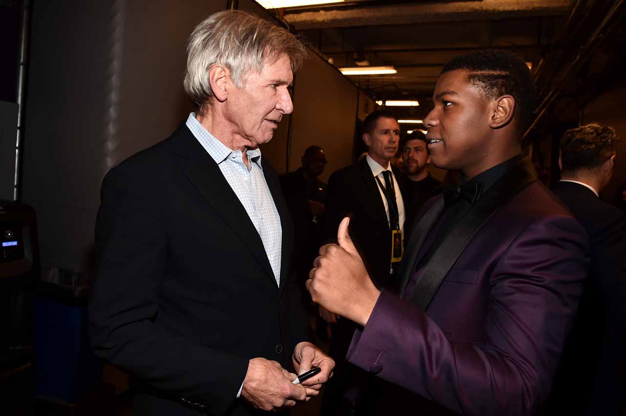 HOLLYWOOD, CA - DECEMBER 14: Actors Harrison Ford (L) and John Boyega attend the World Premiere of ?Star Wars: The Force Awakens? at the Dolby, El Capitan, and TCL Theatres on December 14, 2015 in Hollywood, California.  (Photo by Alberto E. Rodriguez/Getty Images for Disney) *** Local Caption *** Harrison Ford;John Boyega
