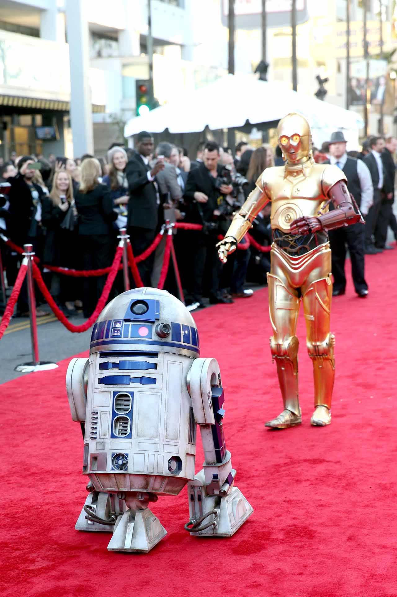 HOLLYWOOD, CA - DECEMBER 14:  R2-D2 (L) and C-3PO attend the World Premiere of ?Star Wars: The Force Awakens? at the Dolby, El Capitan, and TCL Theatres on December 14, 2015 in Hollywood, California.  (Photo by Jesse Grant/Getty Images for Disney) *** Local Caption *** R2-D2;C-3PO