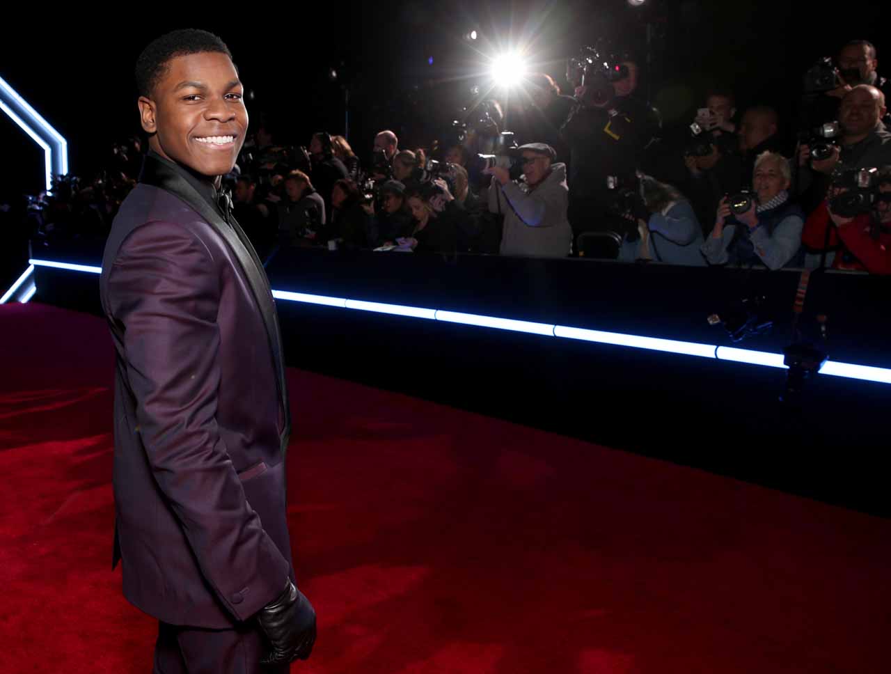 HOLLYWOOD, CA - DECEMBER 14:  Actor John Boyega attends the World Premiere of ?Star Wars: The Force Awakens? at the Dolby, El Capitan, and TCL Theatres on December 14, 2015 in Hollywood, California.  (Photo by Kevin Winter/Getty Images for Disney) *** Local Caption *** John Boyega