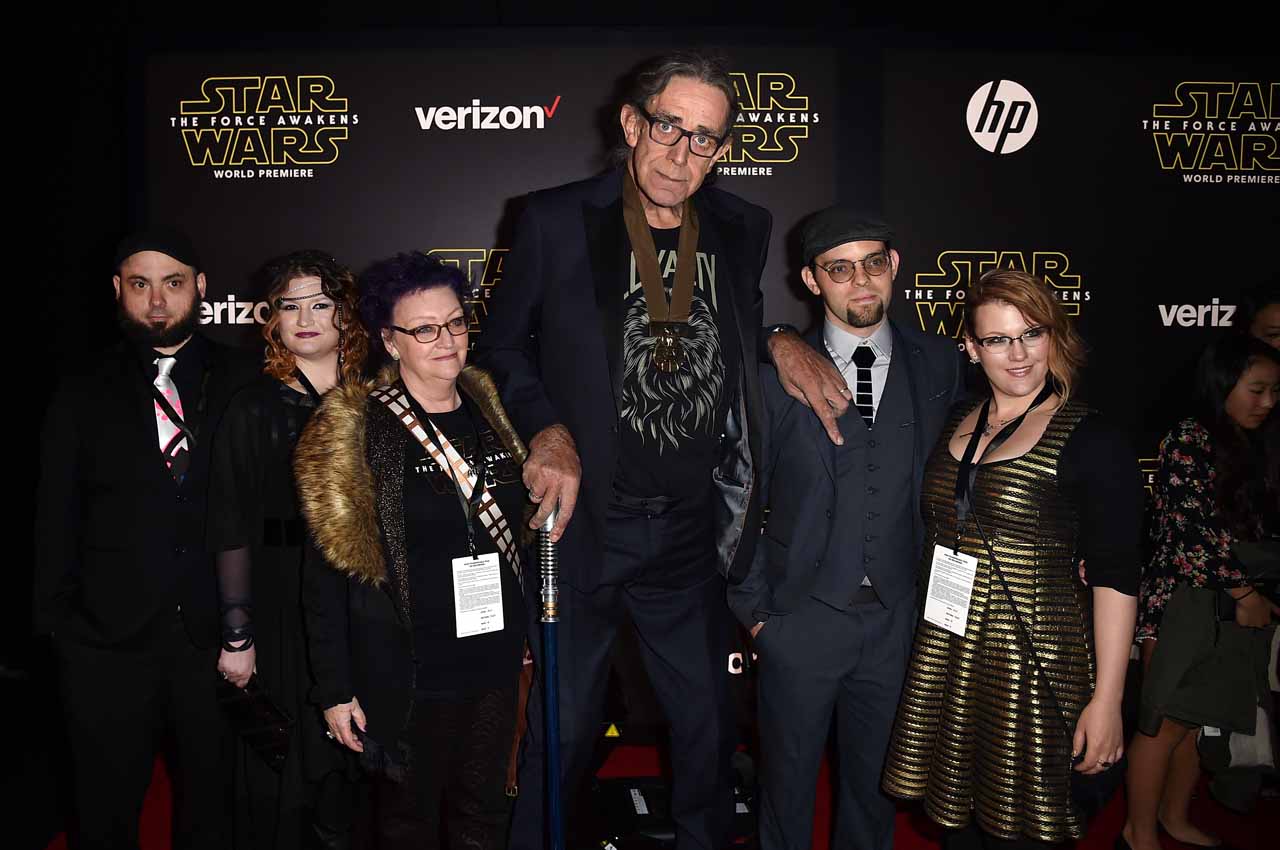 HOLLYWOOD, CA - DECEMBER 14:  Actor Peter Mayhew (C) and family attend the World Premiere of ?Star Wars: The Force Awakens? at the Dolby, El Capitan, and TCL Theatres on December 14, 2015 in Hollywood, California.  (Photo by Kevin Winter/Getty Images for Disney) *** Local Caption *** Peter Mayhew