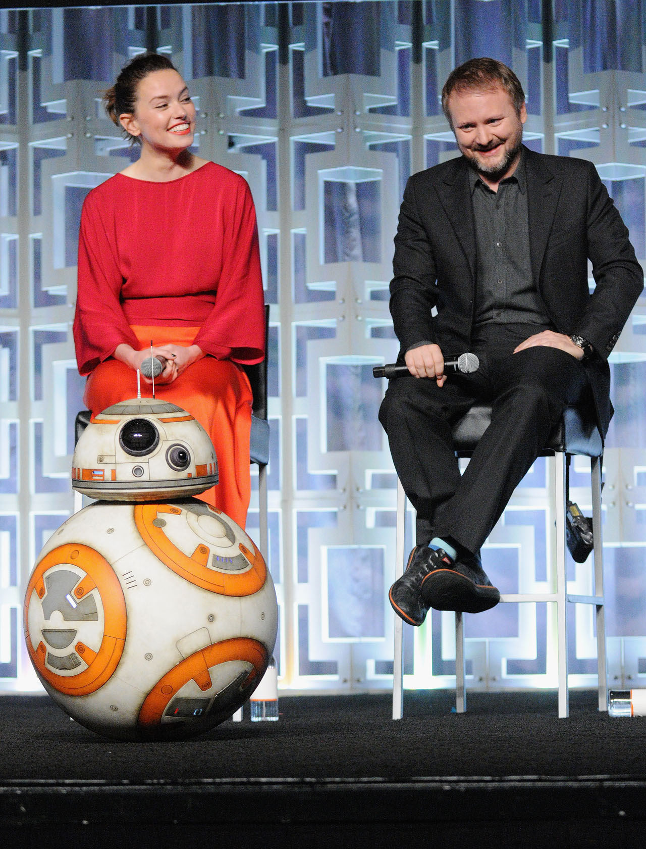 ORLANDO, FL - APRIL 14: BB-8, Daisy Ridley and Rian Johnson attend the STAR WARS: THE LAST JEDI PANEL during the 2017 STAR WARS CELEBRATION at Orange County Convention Center on April 14, 2017 in Orlando, Florida.  (Photo by Gerardo Mora/Getty Images for Disney) *** Local Caption *** BB-8, Daisy Ridley;Rian Johnson