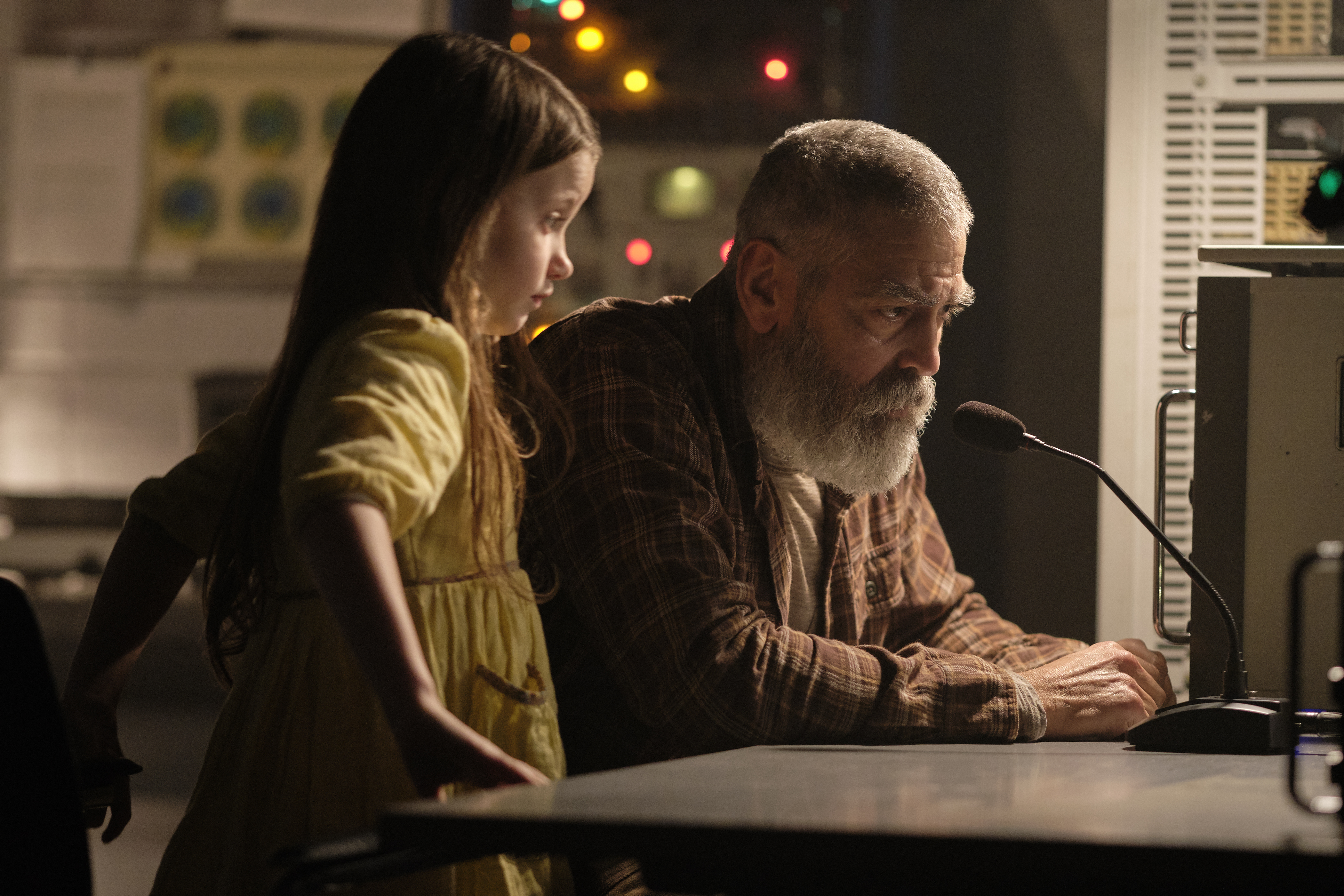 Caoilinn Springall as Iris and George Clooney as Augustine