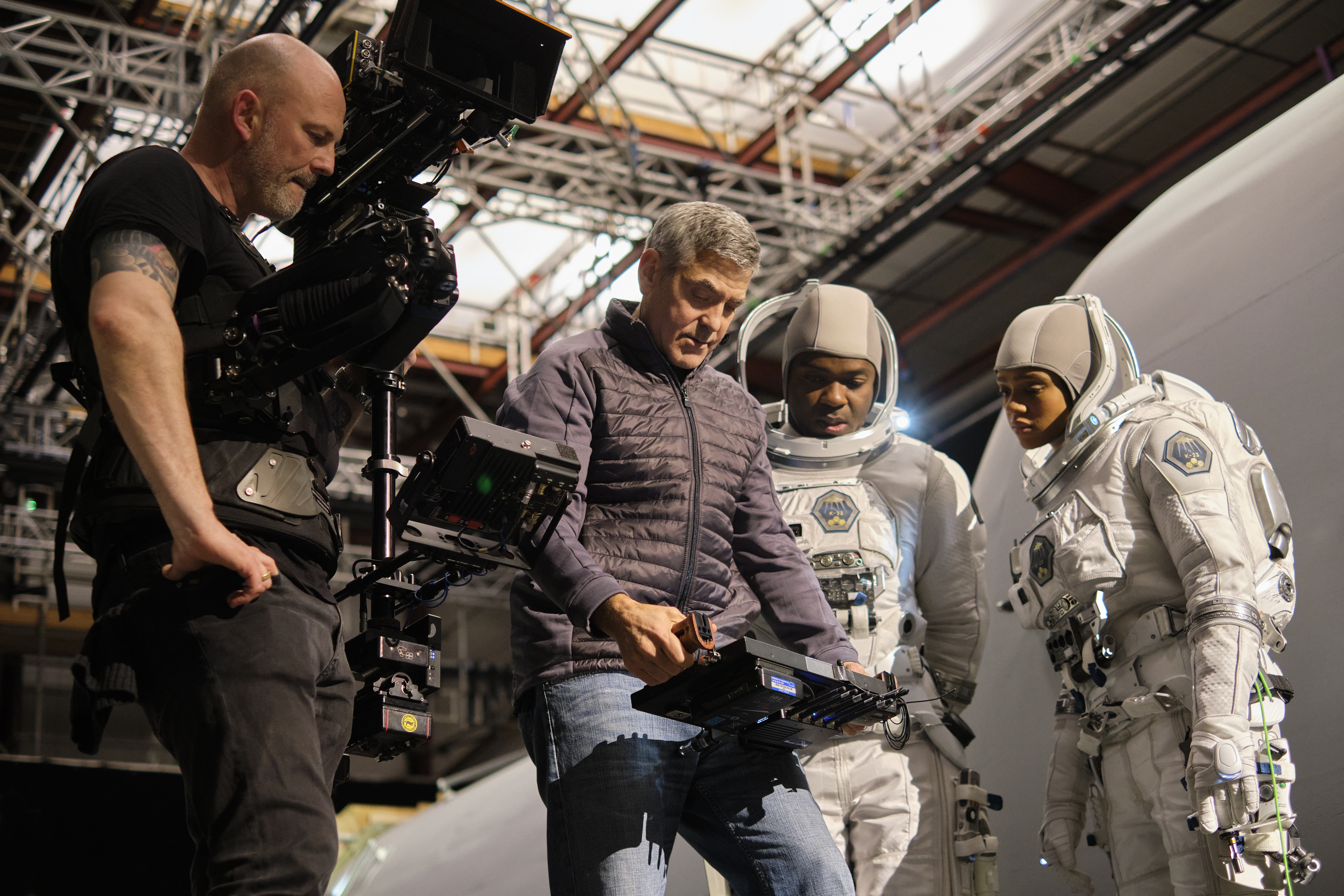 Director George Clooney, David Oyelowo and Tiffany Boone on the set of The Midnight Sky